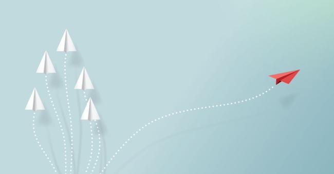 Image of paper airplane taking off in its own direction